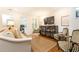 Cozy living room with hardwood floors and comfortable seating arrangement with modern decor at 35 Sheridan Ne Dr # 7, Atlanta, GA 30305