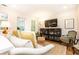 Cozy living room with hardwood floors and comfortable seating arrangement with modern decor at 35 Sheridan Ne Dr # 7, Atlanta, GA 30305