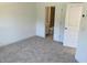 Bedroom featuring carpeted flooring and a bathroom at 1616 Avery Way, Tucker, GA 30084