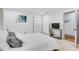 Bright bedroom with view of ensuite bath, neutral decor and contemporary design at 2680 Spalding Dr, Atlanta, GA 30350
