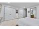 Bedroom featuring ensuite bathroom access and closet, perfect for a modern home at 2680 Spalding Dr, Atlanta, GA 30350