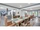 Bright and airy dining area features a modern table, seating for six, and an open-concept design at 2680 Spalding Dr, Atlanta, GA 30350