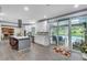 Updated kitchen with central island, modern appliances and backyard access to outdoor pool at 2680 Spalding Dr, Atlanta, GA 30350