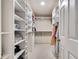 Spacious walk-in closet featuring custom shelving for optimal storage and organization at 2680 Spalding Dr, Atlanta, GA 30350