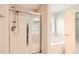 Modern bathroom featuring a glass-enclosed shower and a separate soaking tub at 909 Pine Cove Dr, Lilburn, GA 30047