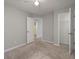 Bedroom featuring carpet flooring and ensuite bath at 1903 Brittania Cir, Woodstock, GA 30188