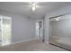 Bedroom showcasing mirrored closet and bath access at 1903 Brittania Cir, Woodstock, GA 30188
