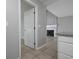 View from hallway to living area with fireplace at 1903 Brittania Cir, Woodstock, GA 30188