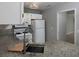 Well-lit kitchen with granite counters, white appliances, and modern faucet at 1903 Brittania Cir, Woodstock, GA 30188