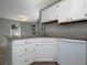 Bright kitchen with granite countertops and modern faucet at 1903 Brittania Cir, Woodstock, GA 30188