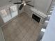 Lofted view of the living room featuring a modern fireplace, ceiling fan, and large windows at 1903 Brittania Cir, Woodstock, GA 30188