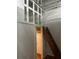 Bedroom featuring a loft area with ladder access and a storage area with cabinets at 20 Marietta Nw St # 10 F, Atlanta, GA 30303