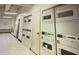 Laundry room with multiple washers and dryers for resident use at 20 Marietta Nw St # 10 F, Atlanta, GA 30303