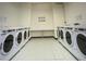 Well-maintained laundry facility with multiple washers for resident use at 20 Marietta Nw St # 10 F, Atlanta, GA 30303