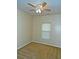 Cozy bedroom with a ceiling fan and a window providing natural light at 207 Brownlee Sw Rd, Atlanta, GA 30331