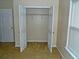 Bedroom closet with ample storage space for clothes and accessories at 207 Brownlee Sw Rd, Atlanta, GA 30331