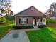 Charming single-story home with a well-maintained lawn and inviting front porch at 207 Brownlee Sw Rd, Atlanta, GA 30331