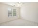 Neutral bedroom with plush carpeting, great natural light and an expansive feel at 4535 Howell Farms Nw Rd, Acworth, GA 30101