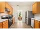 Modern kitchen featuring stainless steel appliances and wood cabinets at 4535 Howell Farms Nw Rd, Acworth, GA 30101