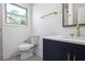 Stylish bathroom features modern vanity, bronze fixtures, and natural light at 1321 Avon Sw Ave, Atlanta, GA 30310