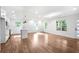 Bright and spacious open-concept living area features hardwood floors and recessed lighting at 1321 Avon Sw Ave, Atlanta, GA 30310