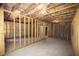 Unfinished basement space with exposed framework, offering a blank canvas for future customization at 2260 Siskin Square Rd # 90, Duluth, GA 30096