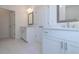 Bathroom featuring double sinks, white cabinets, and modern fixtures at 2260 Siskin Square Rd # 90, Duluth, GA 30096