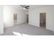 Spacious bedroom with neutral carpet, en-suite bathroom, and walk-in closet at 2260 Siskin Square Rd # 90, Duluth, GA 30096