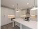 Bright kitchen featuring stainless steel appliances, white cabinetry and a quartz countertops at 2260 Siskin Square Rd # 90, Duluth, GA 30096