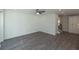 Bright living room with wood floors leading to the stairs and open to the kitchen at 2260 Siskin Square Rd # 90, Duluth, GA 30096
