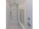 Modern shower with glass door and marble tile surround at 2260 Siskin Square Rd # 90, Duluth, GA 30096