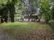 Spacious backyard with mature trees offering ample space for outdoor activities and relaxation at 2985 Laguna Dr, Decatur, GA 30032
