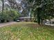 Charming one-story home with a classic brick facade and a well-maintained front yard at 2985 Laguna Dr, Decatur, GA 30032