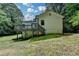 Back of house with upper deck and walk out basement access at 4278 Trotters Ln, Auburn, GA 30011