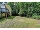 The house has an expansive backyard with a charming deck and stair access at 4278 Trotters Ln, Auburn, GA 30011