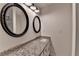 Bathroom features a double vanity, granite countertops, decorative mirrors, and a walk-in shower at 4278 Trotters Ln, Auburn, GA 30011