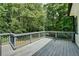 Spacious deck with painted wood and railing at 4278 Trotters Ln, Auburn, GA 30011