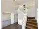 Spacious foyer with staircase, hardwood floors, and attractive molding at 6260 Selborn Sw Dr, Atlanta, GA 30331