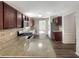 Modern kitchen featuring stainless steel appliances, granite countertops, and hardwood floors at 6260 Selborn Sw Dr, Atlanta, GA 30331