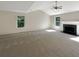 Bright living room with vaulted ceiling, fireplace, neutral carpet, and ample natural light at 6260 Selborn Sw Dr, Atlanta, GA 30331