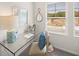 Cozy office space with clear desk, comfortable chair, and a window with natural light at 6427 Rosetta Dr # 64, South Fulton, GA 30331