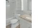 Clean bathroom with shower-tub combo and granite vanity at 6964 Oakhill Cir, Austell, GA 30168