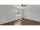 Bedroom with hardwood floors and natural light at 6964 Oakhill Cir, Austell, GA 30168