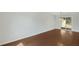 Dining room with stylish floors, chandelier, and sliding glass door leading to the backyard at 6964 Oakhill Cir, Austell, GA 30168