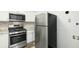 Well-equipped kitchen with stainless steel appliances and ample cabinet space at 6964 Oakhill Cir, Austell, GA 30168