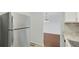 Kitchen view showing modern appliances and sightlines to the dining area at 6964 Oakhill Cir, Austell, GA 30168