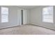 Neutral bedroom with new carpeting and plenty of natural light at 783 Lost Creek Cir, Stone Mountain, GA 30088