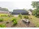 Sprawling backyard with garden area and mature trees at 1520 Great Oaks Dr, Lawrenceville, GA 30045
