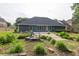Beautiful backyard with a patio and lush landscaping at 1520 Great Oaks Dr, Lawrenceville, GA 30045