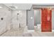 Modern bathroom design featuring a spacious walk-in shower with dual heads and convenient built-in bench at 1520 Great Oaks Dr, Lawrenceville, GA 30045